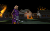 A Drow fighter looks on as the village burns